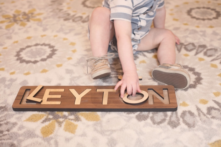 Games to play with a toddler: Wooden Name Puzzle from Smiling Tree Toys are so wonderful for your babies development. Games for your toddler from Heather Brown of MyLifeWellLoved.com