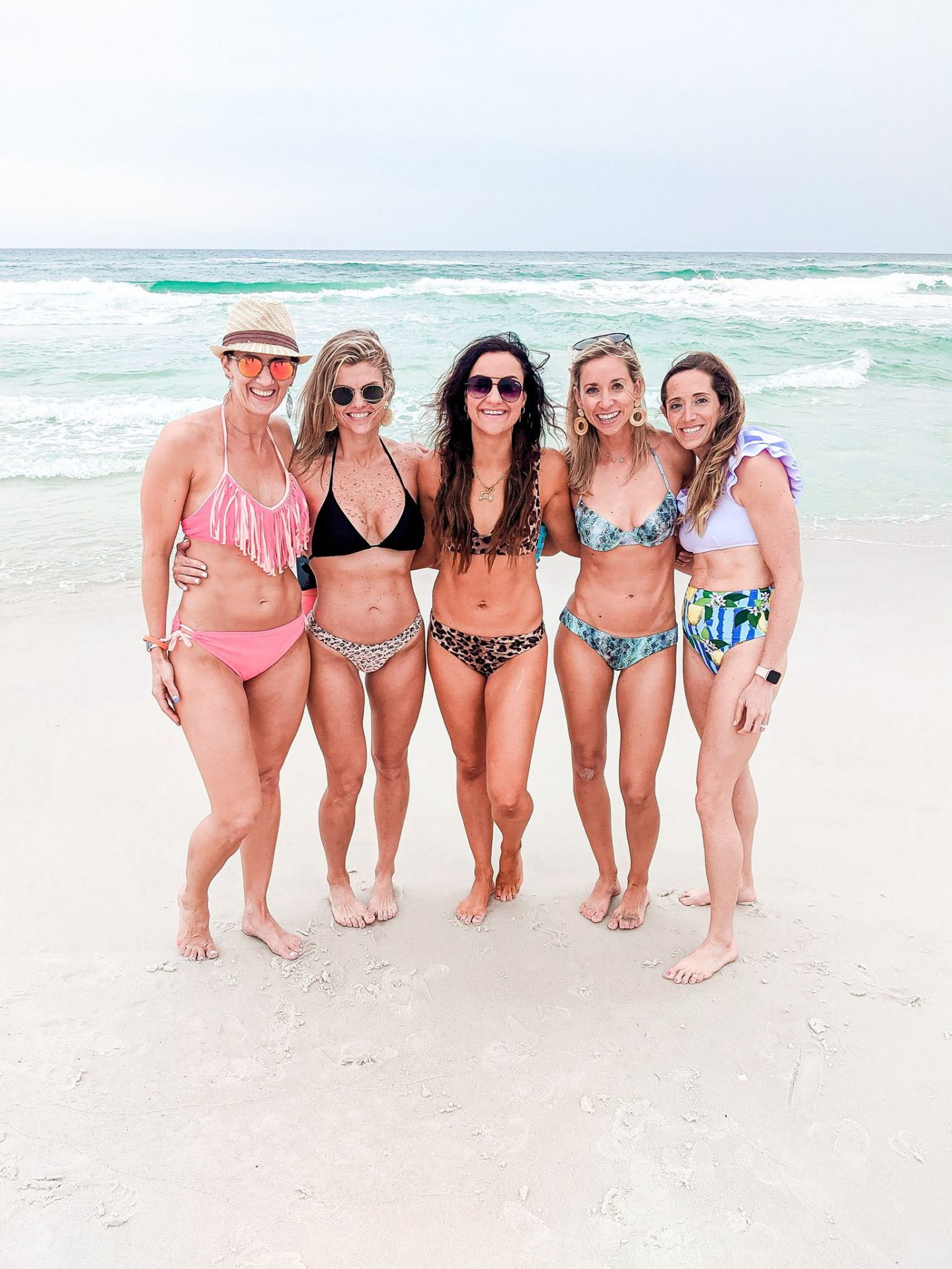 Girls at the beach, cute swimsuits, ocean photo