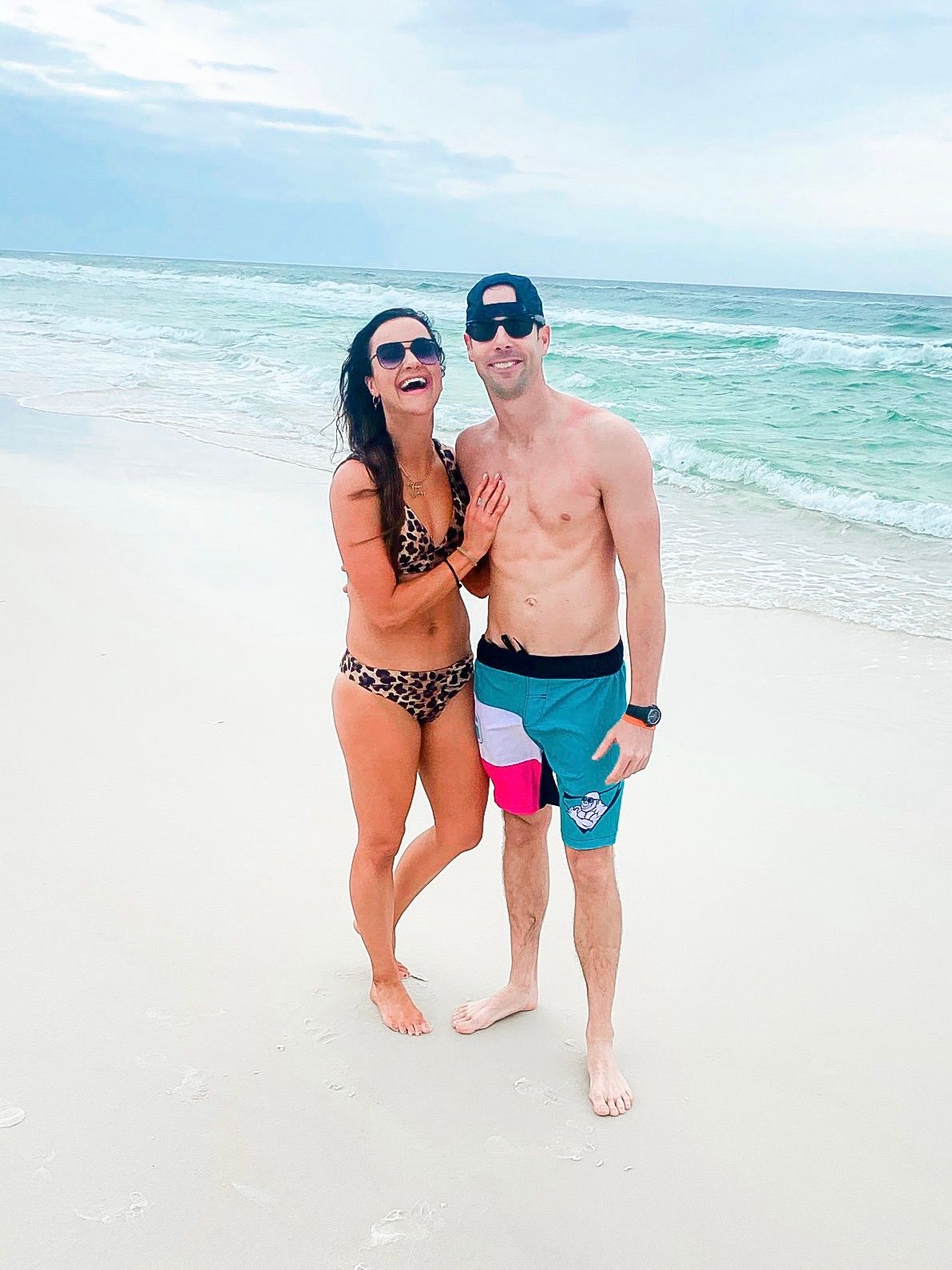 Husband and wife photo at the beach, couples swimwear