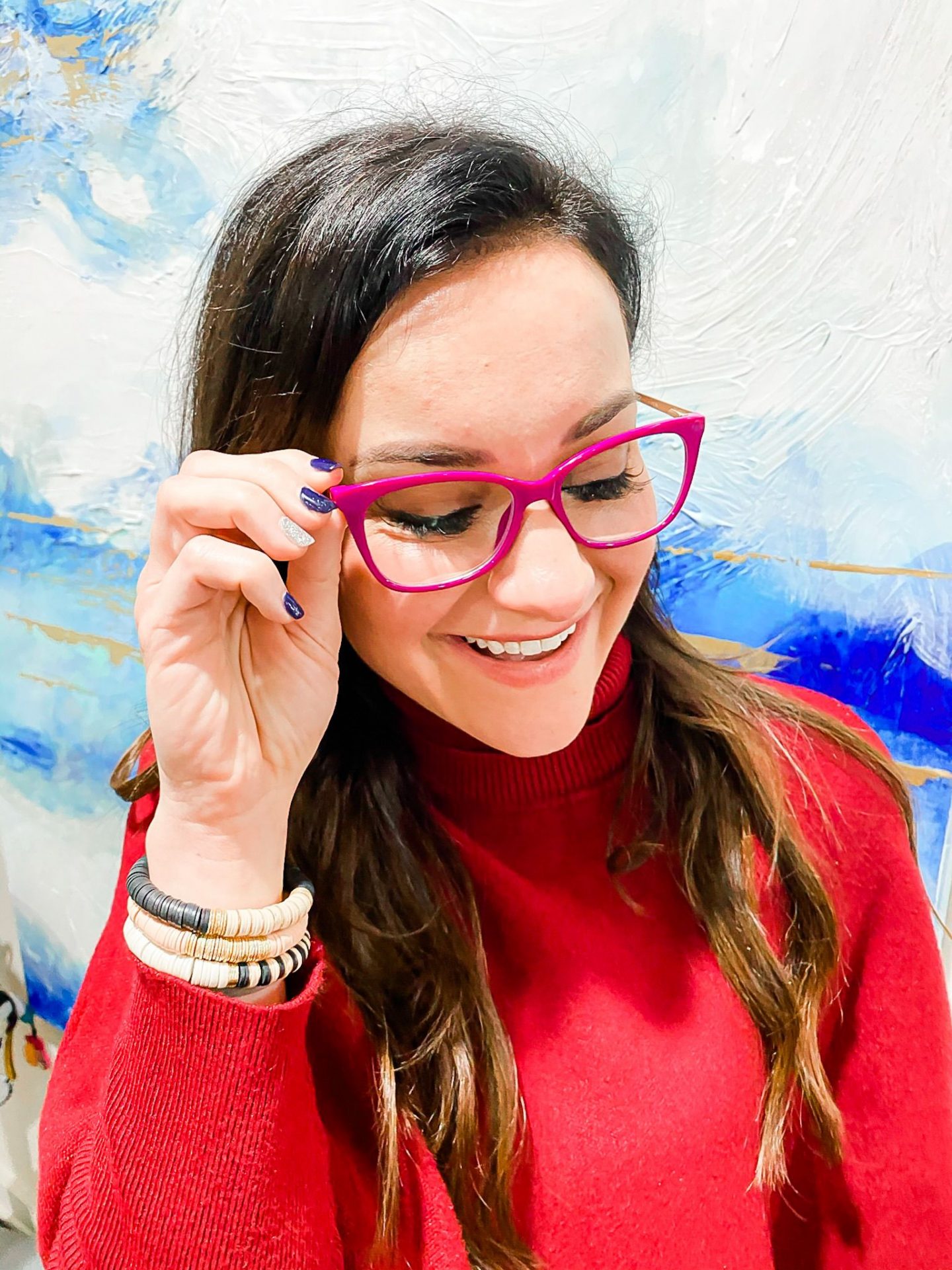 Brunette girl wearing pink glasses, blue light blocking glasses 